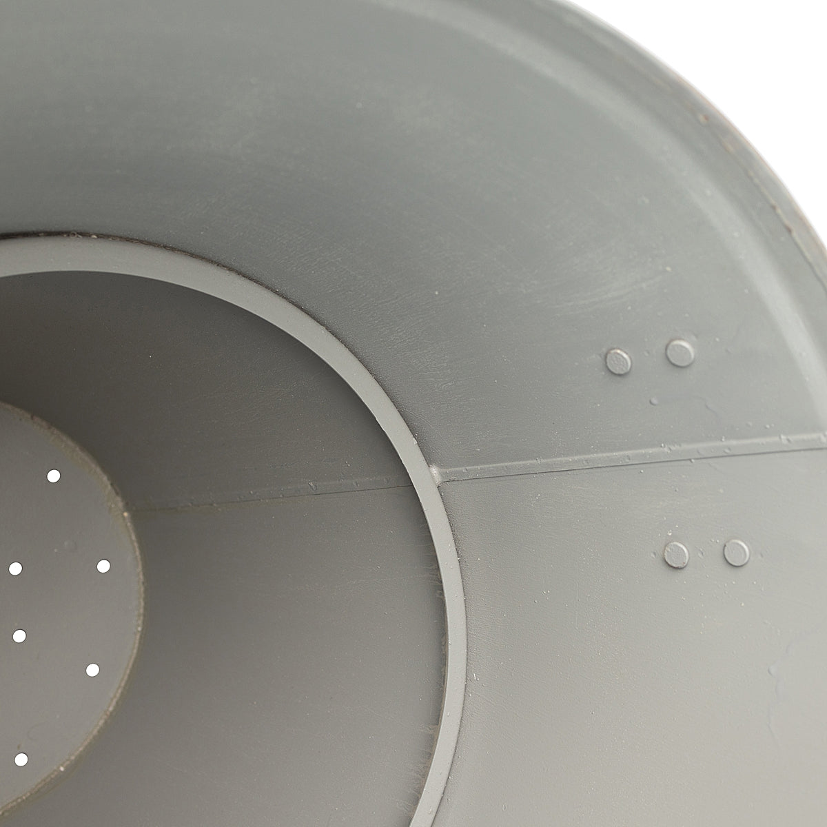 Close-up of inner protective coating on the galvanized tapered metal planter with handles