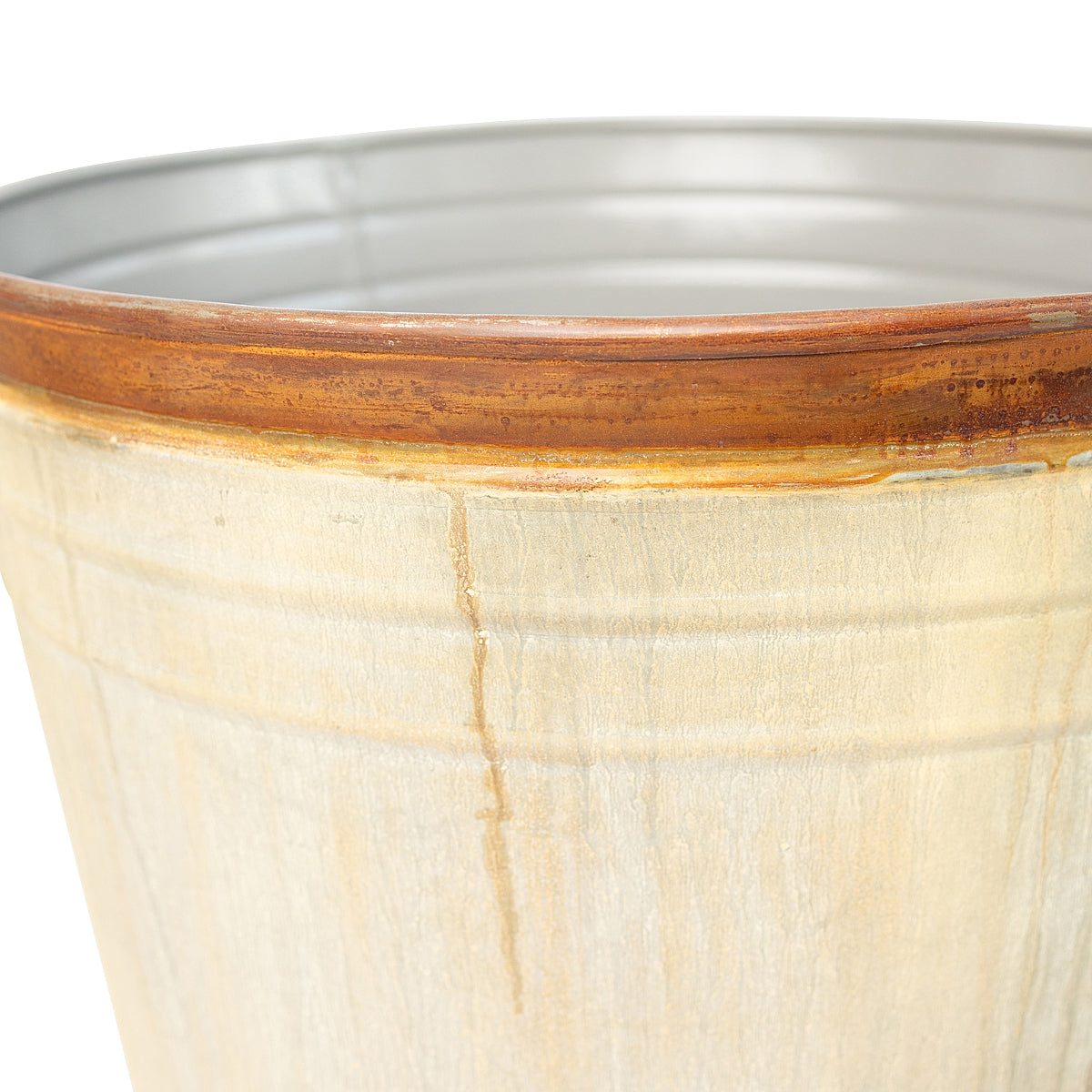 Close-up of the Tall Weathered Whitewash Steel Planter showcasing the top contrasting rusted band and details of the whitewash color.