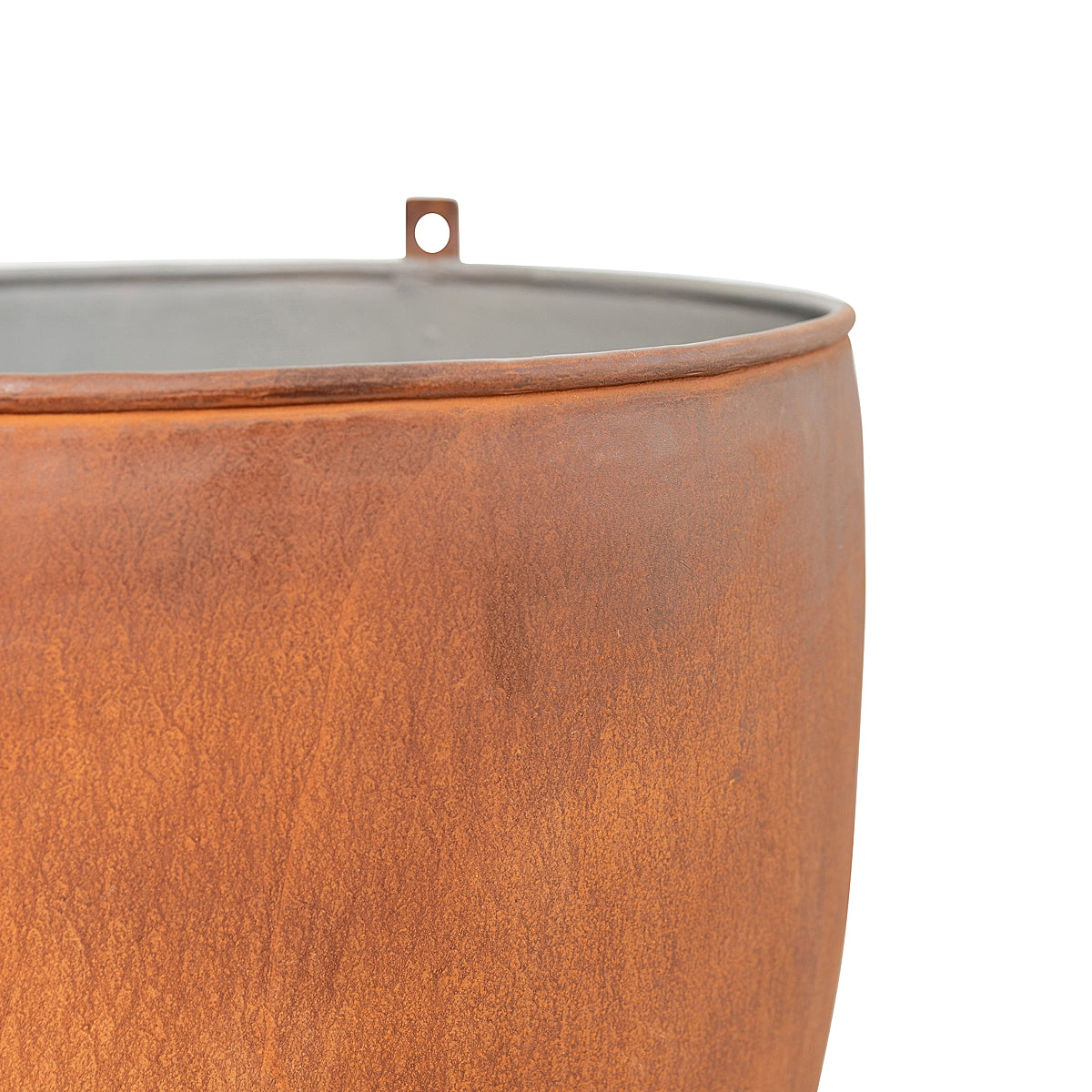 Close-up of color on Aged Round Ore Bucket Steel Planter with a rich aged rust patina finish, inspired by rugged, vintage ore buckets on a white background.