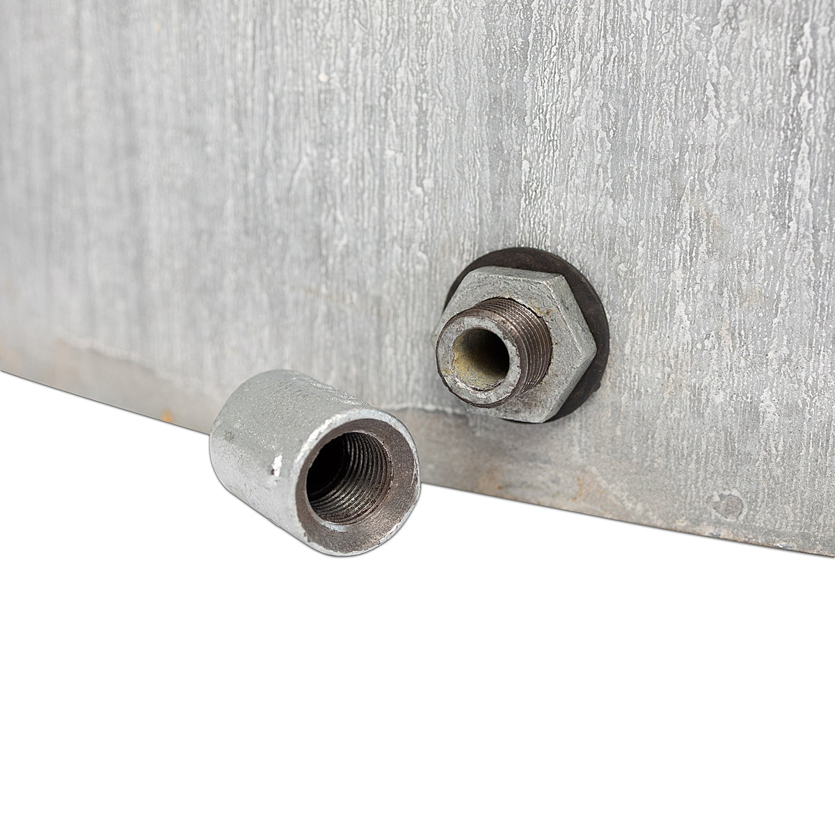 Drain plug on the rustic oval water trough planter with a weathered finish and a distinctive rust-toned band, showcasing classic farmhouse charm on a white background.