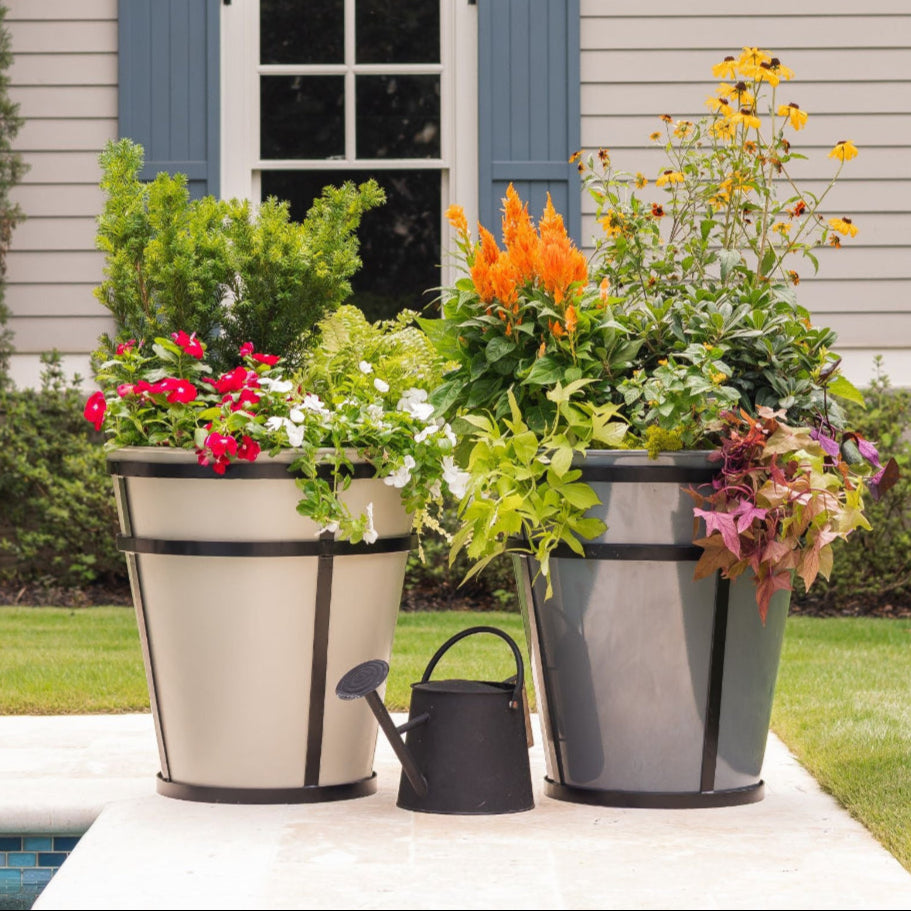 Decorative outdoor planters with flowers in a backyard