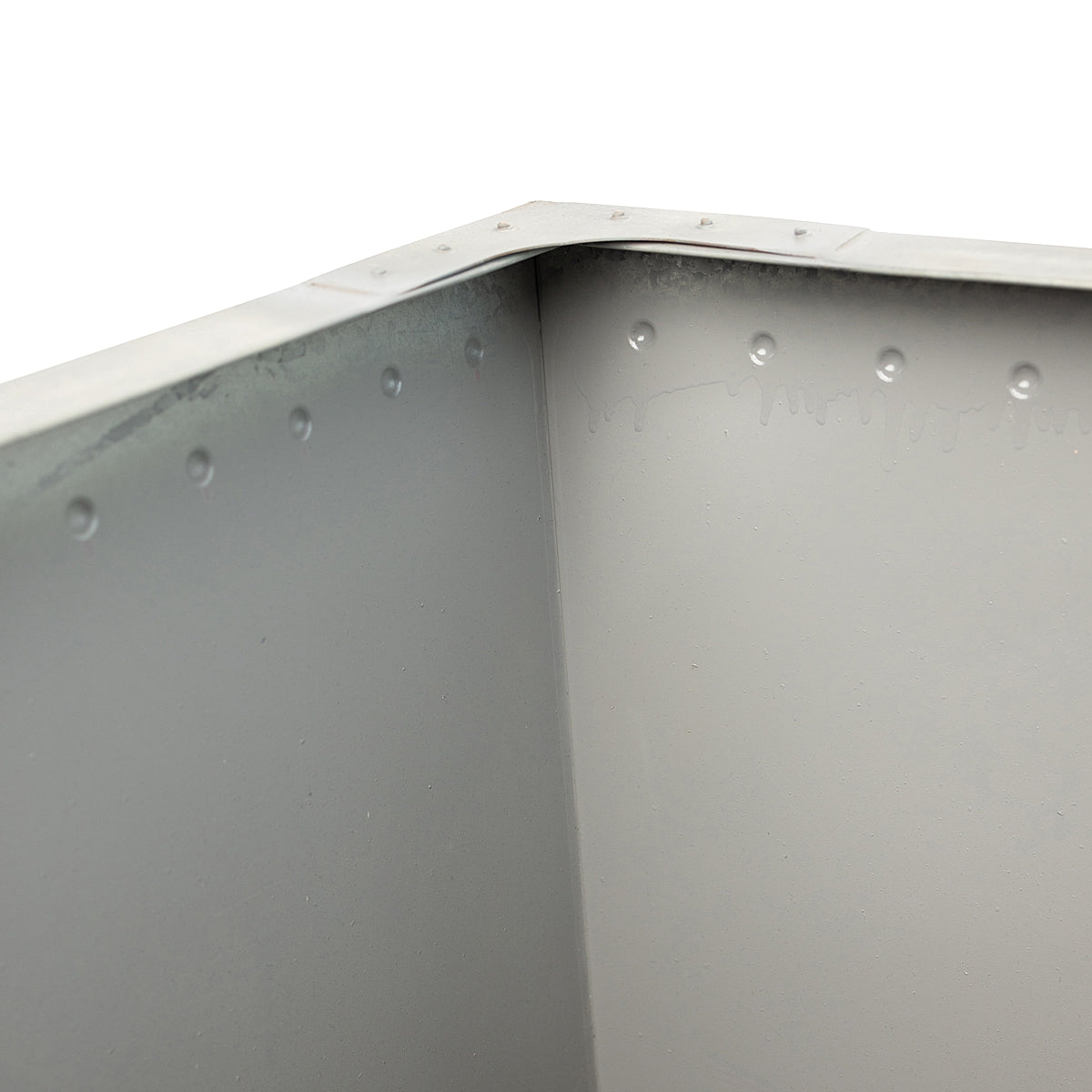 Close-up of the interior epoxy of Honey Bee Outdoor vintage planter on a white background.